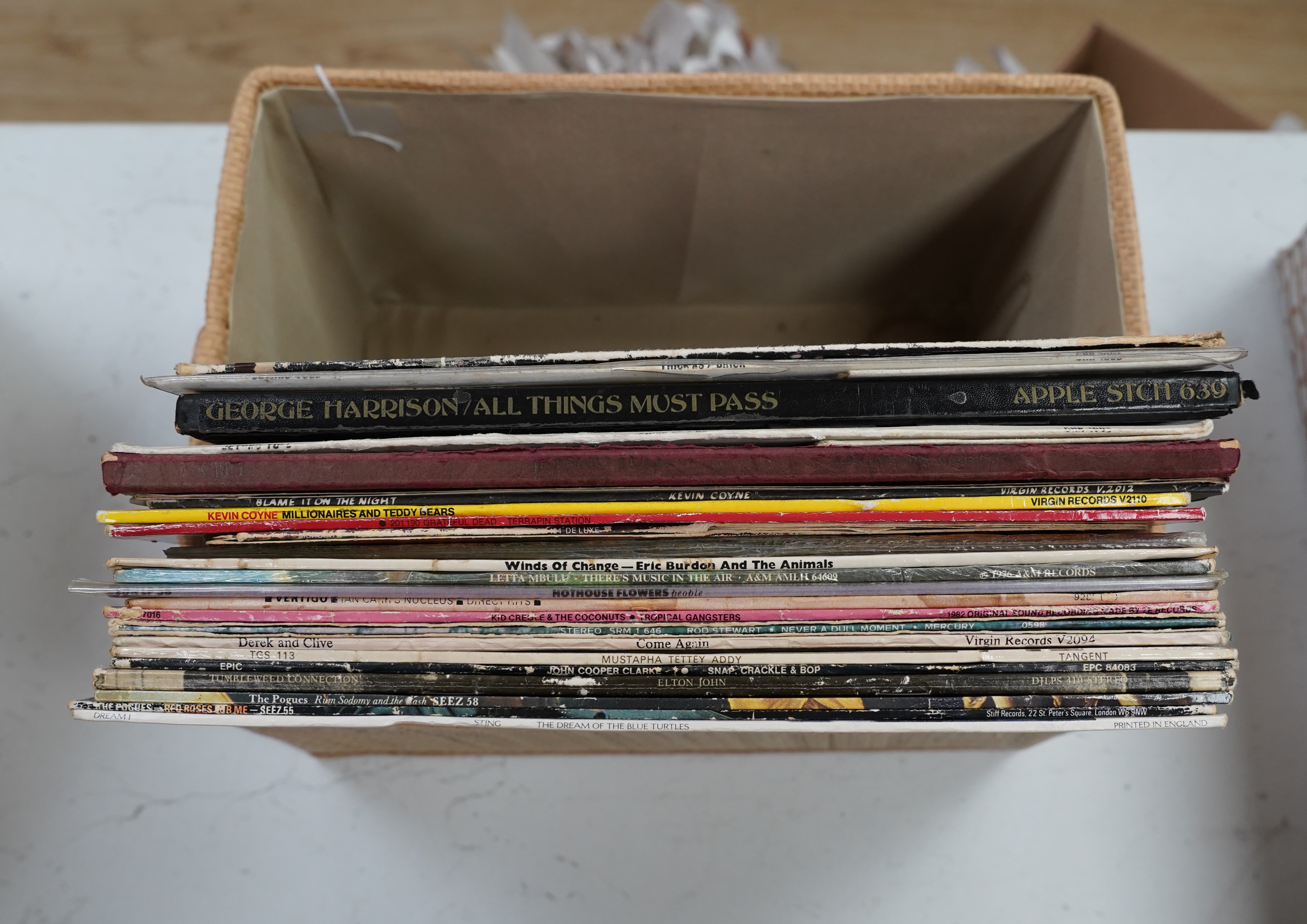 Twenty-five LP records by artists including; George Harrison, Jethro Tull, Grateful Dead, Rod Stewart, etc.